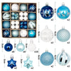 A collection of festive Christmas ornaments featuring various snowflake and geometric designs in blue, silver, and white.
