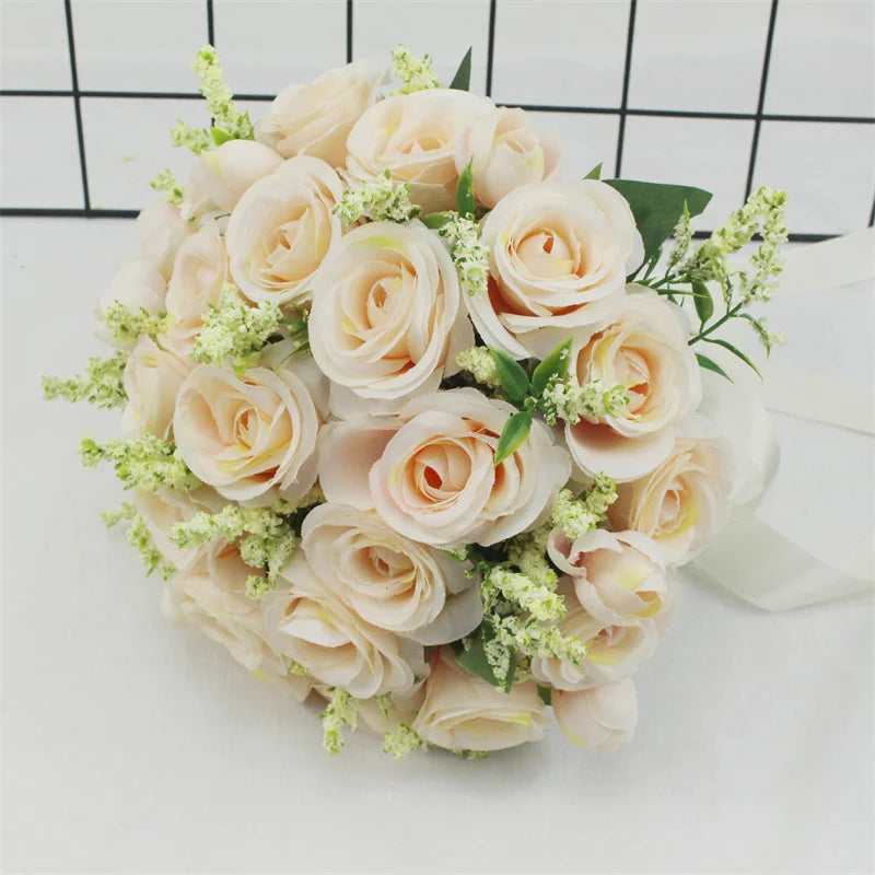 A bouquet of elegant white silk roses with light green filler flowers