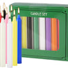 A green box containing a set of twenty hand-poured soy wax stick candles in various colors like purple, yellow, and blue.