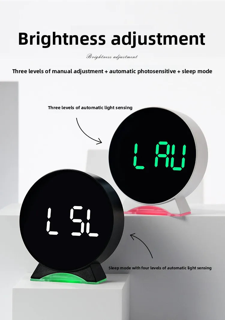 A black LED ambient light clock displaying LAU and LSL, showing brightness adjustment features.
