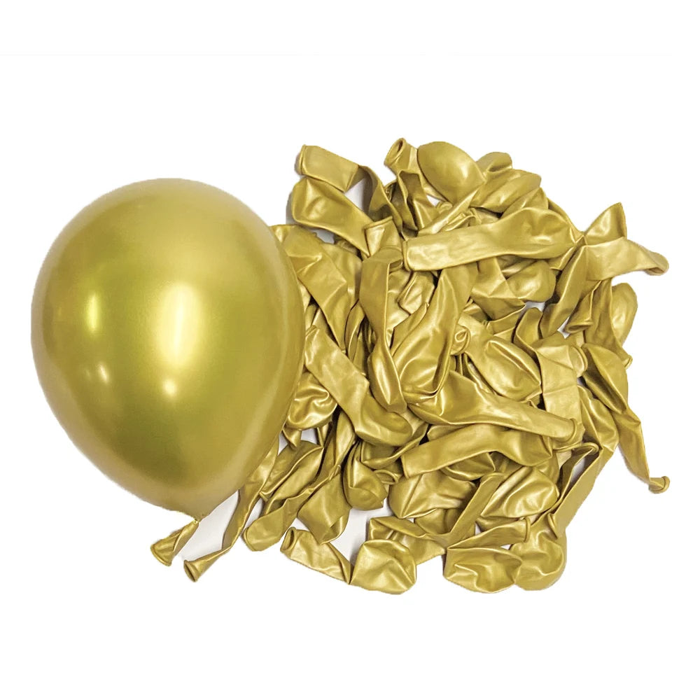 A pile of metallic gold latex balloons scattered on a white background.