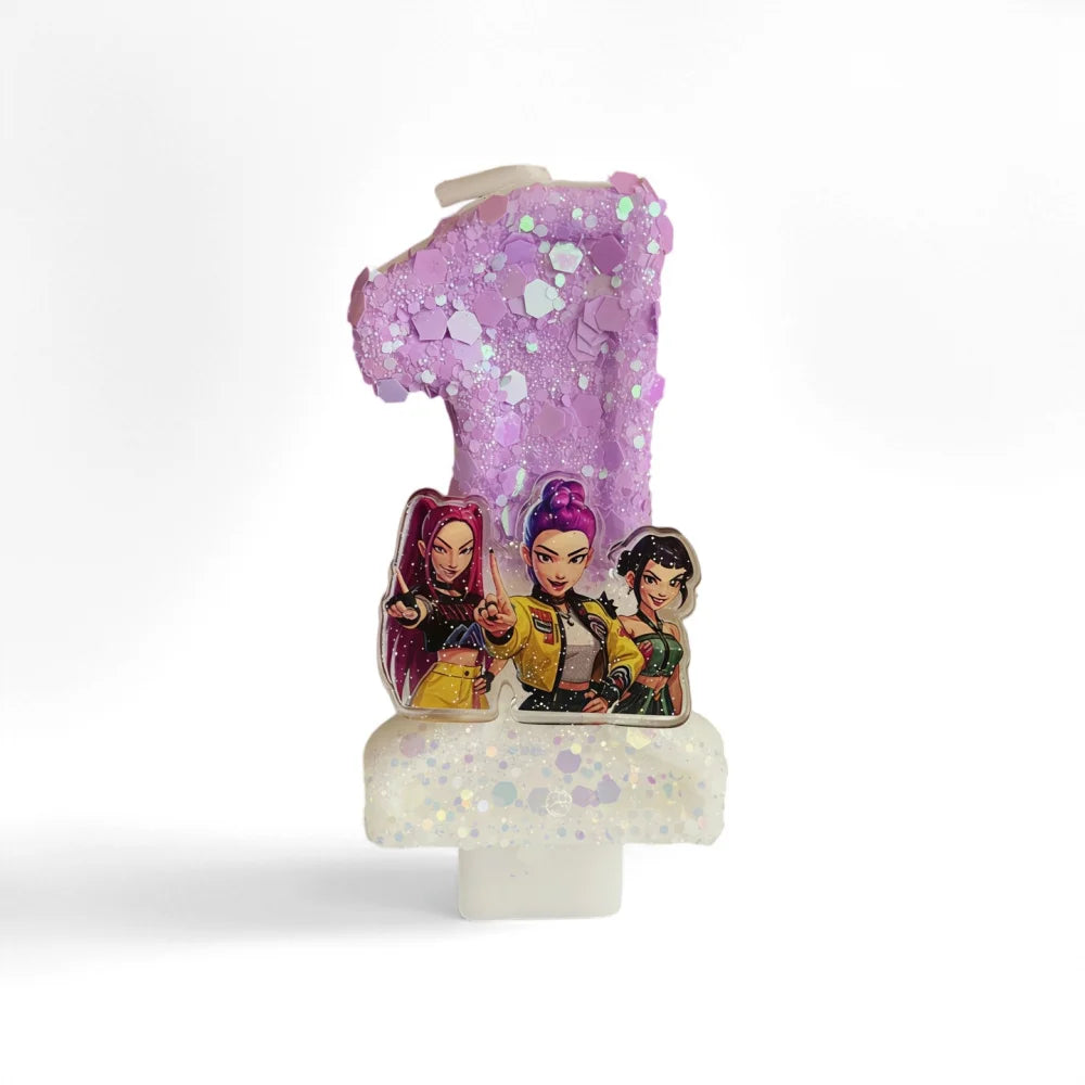 A purple glitter candle featuring three characters from a movie, set on a white base.
