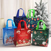 A collection of festive Christmas non-woven gift tote bags in blue, red, and green with holiday prints displayed in front of 