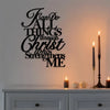 Black script wall art featuring the verse "Fan Do All Things Through Christ Who Strengthens Me" displayed on a white shelf.