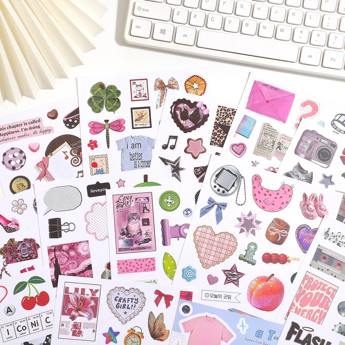 A collection of aesthetic Y2K and pink decorative stickers for journaling and crafting