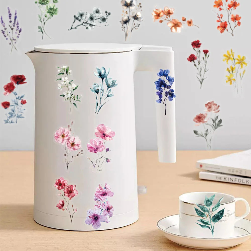 A white water bottle featuring delicate watercolor floral decals in shades of pink, purple, and blue.