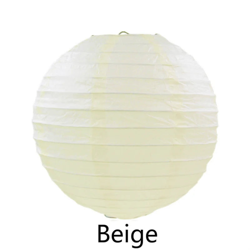 A round beige paper lantern with horizontal folds.