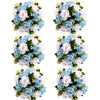A set of six bouquets featuring light blue and white silk artificial roses and greenery.