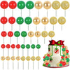 A set of colorful foam ball cake toppers in various colors including red, green, and gold.