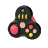 A black fidget cube with various colored buttons and a small peg visible.