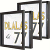 A set of three black wooden frames displaying a white jersey with gold lettering and a signature.