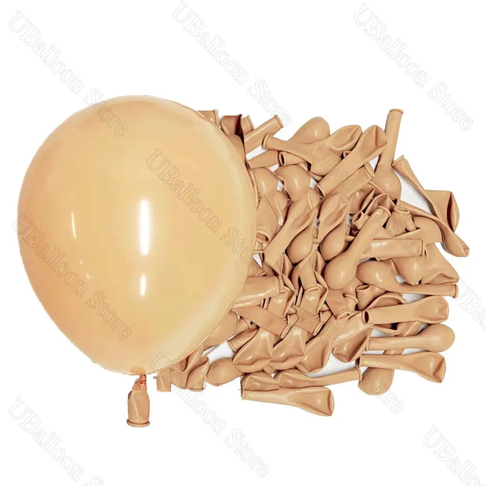 A bunch of tan latex balloons and one large beige balloon are shown for party decor.