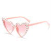 Pink heart-shaped sunglasses embellished with pearls for brides