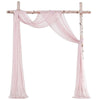 Pink chiffon drapes forming an elegant arch for weddings and events