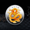 A round collectible coin featuring a golden dragon design against a silver background.