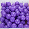 A collection of purple and blue shiny plastic balls for kids' play areas