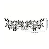 Black metal calligraphy wall art featuring intricate floral and vine designs.