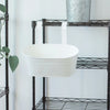 A white rectangular planter is displayed on a black metal shelving unit.