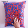 A bag filled with red and blue foam beads for crafting and decoration
