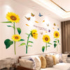 Wall stickers featuring yellow sunflowers and butterflies on a white wall.