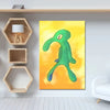 A vibrant yellow background features a green, elongated cartoon character print displayed on a white wall.