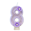 A purple sparkling number eight candle decorated with small purple flowers.