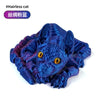 A blue articulated Sphynx cat figurine with yellow eyes, designed as a poseable desk decor.