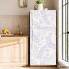 A modern refrigerator with a white and purple floral pattern is displayed next to wooden cabinetry.