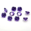 A collection of round and marquise cut purple cubic zirconia loose stones for jewelry making.