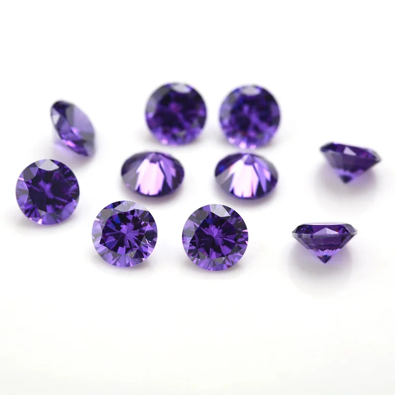 A collection of round and marquise cut purple cubic zirconia loose stones for jewelry making.