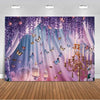 A dreamy purple butterfly photo backdrop featuring cascading purple vines and pink lighting for events.