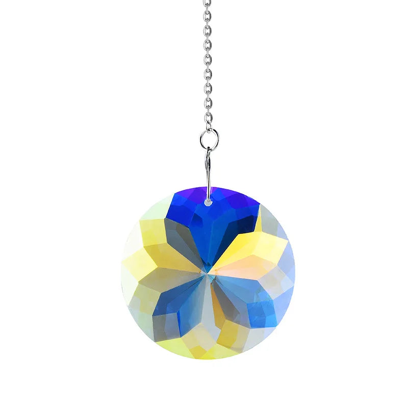 A hanging crystal wind chime featuring blue, yellow, and clear faceted glass elements.