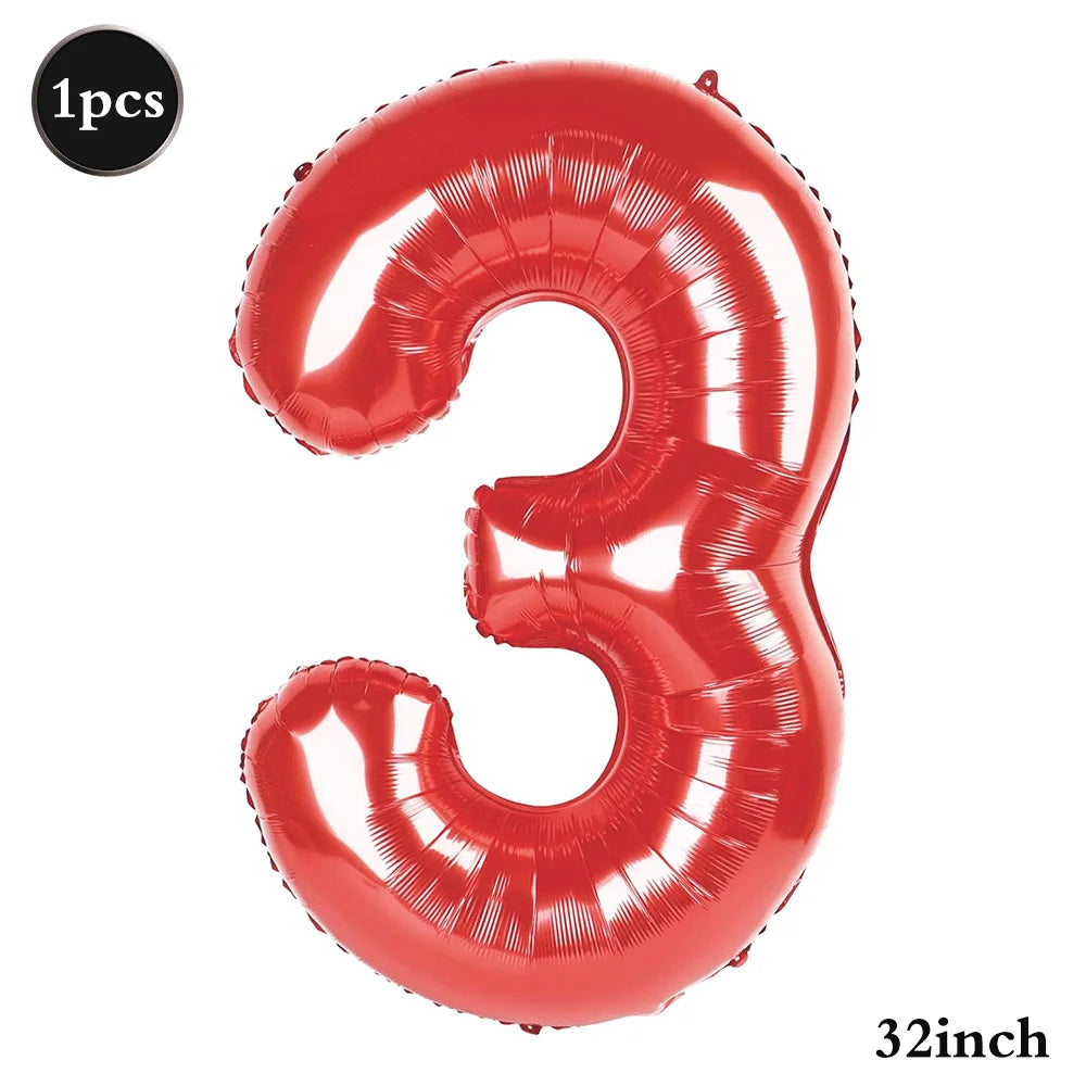 A shiny red foil balloon shaped like the number three, measuring 32 inches.