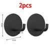 Two black stainless steel self-adhesive wall hooks shown with dimensions.