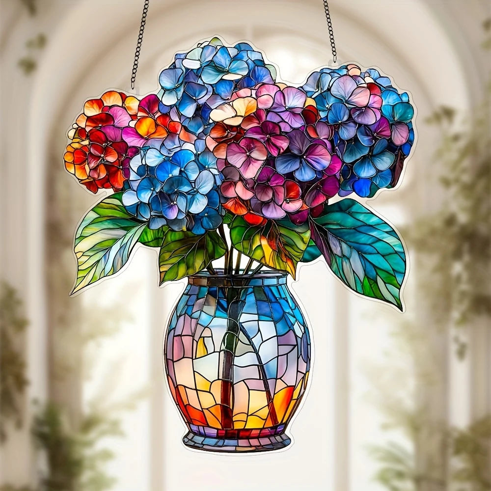 A colorful acrylic floral pendant featuring a bouquet of multi-hued flowers in a glass vase, suspended by a chain.