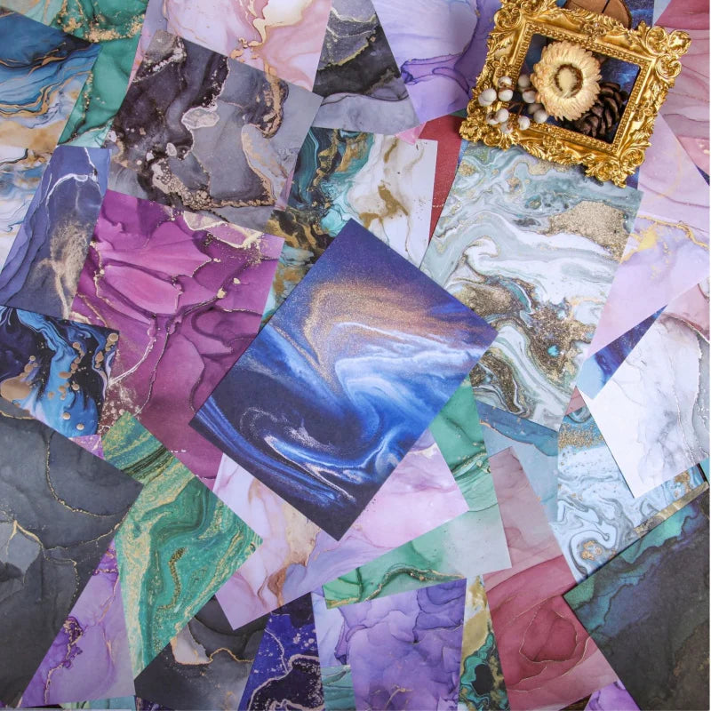 A colorful pack of gradient wash retro decorative paper featuring marbled textures and gold accents.
