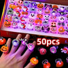 A hand displays a set of 50 glow rings featuring various Halloween-themed designs like pumpkins and ghosts.
