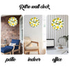 A yellow and green retro wall clock with a lemon design displayed in indoor, patio, and office settings.