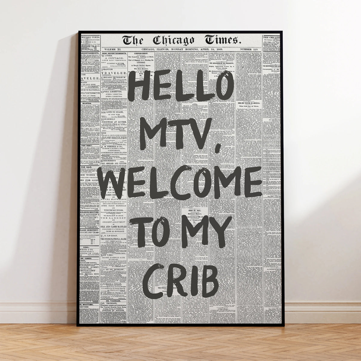 Black and white canvas wall art featuring a vintage newspaper headline that reads HELLO MTV WELCOME TO MY CRIB
