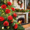A Christmas tree decorated with realistic red foam rose flower heads.