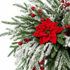 Artificial Norfolk pine branches with red berry stems used for holiday decoration.