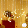 Golden star and crescent moon LED string lights hanging in a warm, cozy room setting
