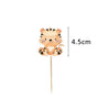 A cute orange and black tiger cake topper on a stick, measuring 4.5cm long.