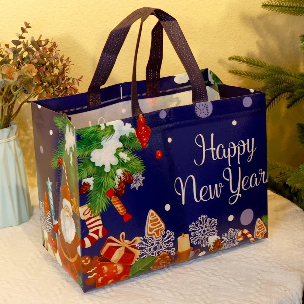 A dark blue tote bag with festive Christmas designs and handles, set against a light background.