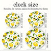 A set of four round wall clocks featuring yellow lemons and green leaves for home decor.