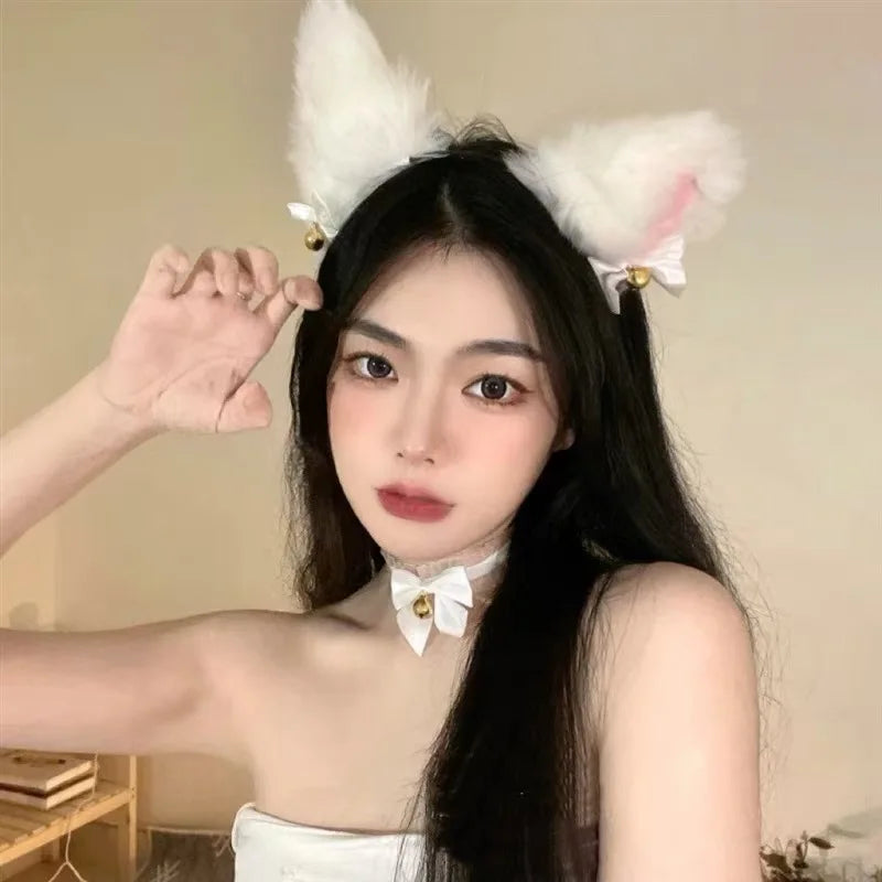 A woman models a Kawaii Cat Ear Headband with Bell Choker set against a light background.