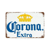 Vintage beer metal sign featuring a golden crown and blue text reading Corona Extra