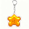 A yellow star shaped acrylic keychain charm with a silver split ring.
