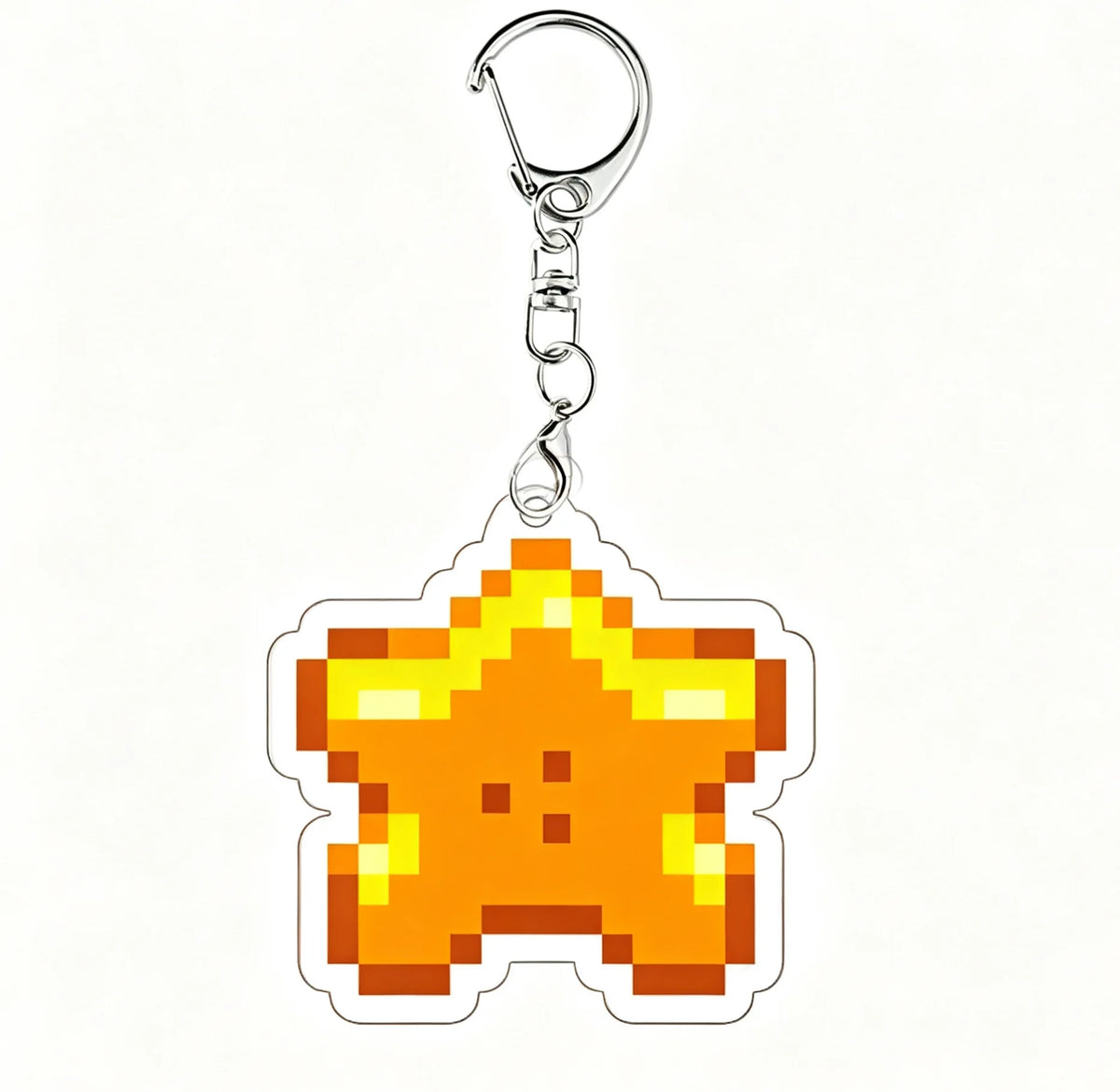 A yellow star shaped acrylic keychain charm with a silver split ring.