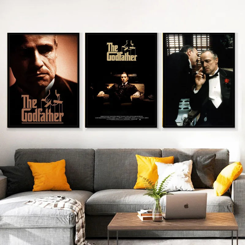 A set of three black and white canvas prints featuring scenes from The Godfather displayed on a white wall.